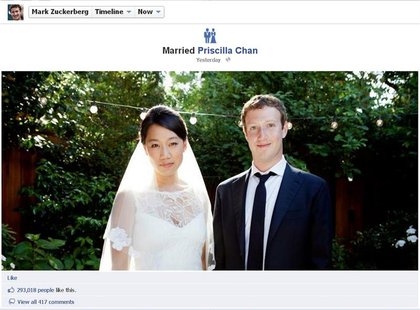 Facebook co-founder and CEO Mark Zuckerberg and Priscilla Chan are seen in this screengrab of a wedding photo posted on Zuckerberg's Faceboo Facebook co-founder and CEO Mark Zuckerberg and Priscilla Chan are seen in this screengrab of a wedding photo posted on Zuckerberg's Faceboo