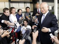 International Atomic Energy Agency (IAEA) Director General Yukiya Amano briefs the media before his trip to Tehran at the international airp