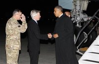 U.S. President Barack Obama shakes hands with U.S. Ambassador to Afghanistan Ryan Crocker upon his arrival at Bagram Air Base in Kabul, Afgh