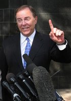Former Enron Chief Executive Jeffrey Skilling says "one more day" left on the witness stand in response to reporters' questions as he leaves