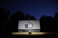 The sun rises behind the entrance sign to Facebook headquarters in Menlo Park before the company's IPO launch, May 18, 2012. REUTERS/Beck Di