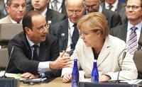 German Chancellor Angela Merkel (R) listens to French President Francois Hollande during the 2012 NATO Summit in Chicago, May 21, 2012. REUT