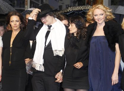 Cast members Karole Rocher (L) and Pete Doherty (2ndL) and Lily Cole (R) arrive on the red carpet for the film "Confession of a Child of the Cast members Karole Rocher (L) and Pete Doherty (2ndL) and Lily Cole (R) arrive on the red carpet for the film "Confession of a Child of the