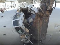 A Northwest Airlines' McDonnell Douglas DC9-30, approximately 30 years old, is demolished at Minneapolis International Airport in this hando