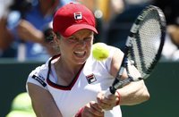 Kim Clijsters of Belgium hits a return to Julia Goerges of Germany during their match at the Sony Ericsson Open tennis tournament in Key Bis