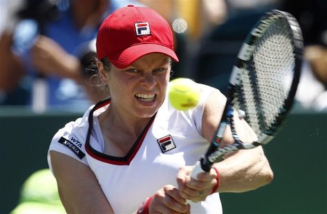 Kim Clijsters of Belgium hits a return to Julia Goerges of Germany during their match at the Sony Ericsson Open tennis tournament in Key Bis Kim Clijsters of Belgium hits a return to Julia Goerges of Germany during their match at the Sony Ericsson Open tennis tournament in Key Bis