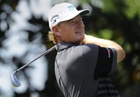 Ernie Els of South Africa watches his tee shot on the second hole during third round play in the Arnold Palmer Invitational PGA golf tournam