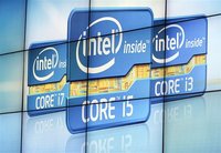 A video wall displays Intel's logos at the unveiling of its second generation Intel Core processor family during a news conference at the Co