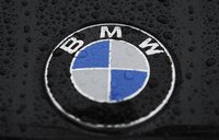 A logo of BMW is pictured on a car before the German luxury carmaker BMW annual shareholders meeting at the company's headquarters in Munich
