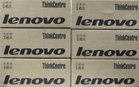 Boxes containing Lenovo desktop computers are seen in an office in Kiev March 12, 2012. REUTERS/Gleb Garanich