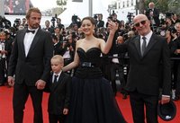 Director Audiard (R) arrives on the red carpet with cast members Matthias Schoenaerts (L), Armand Verdure (2ndL) and Marion Cotillard for th