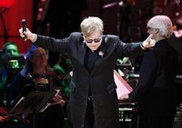 Musician Elton John performs during the benefit "Songs From the Silver Screen" to raise funds for The Rainforest Trust at Carnegie Hall in N