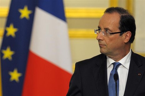 France's President Francois Hollande attends a joint news conference with Spanish Prime Minister Mariano Rajoy at the Elysee Palace in Paris France's President Francois Hollande attends a joint news conference with Spanish Prime Minister Mariano Rajoy at the Elysee Palace in Paris