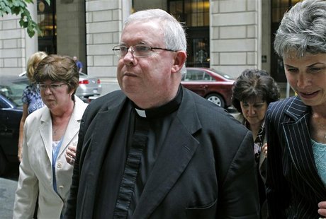 Monsignor William Lynn returns to the courthouse after lunch recess during his second day on the witness stand for his sexual abuse trial in Monsignor William Lynn returns to the courthouse after lunch recess during his second day on the witness stand for his sexual abuse trial in