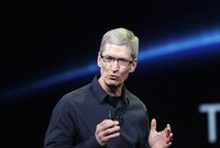 Apple CEO Tim Cook speaks on stage during an Apple event introducing the new iPad in San Francisco, California in this March 7, 2012 file ph
