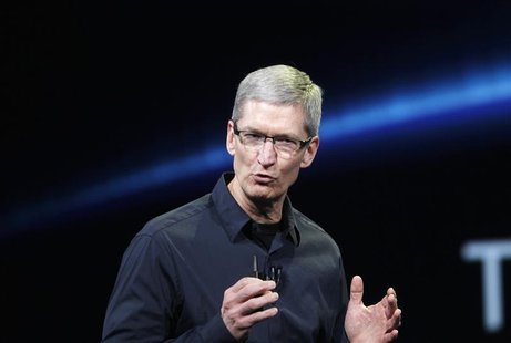 Apple CEO Tim Cook speaks on stage during an Apple event introducing the new iPad in San Francisco, California in this March 7, 2012 file ph Apple CEO Tim Cook speaks on stage during an Apple event introducing the new iPad in San Francisco, California in this March 7, 2012 file ph