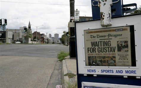 A copy of The Times-Picayune is displayed on a deserted downtown street after the evacuation of New Orleans, prior to the arrival of Hurrica A copy of The Times-Picayune is displayed on a deserted downtown street after the evacuation of New Orleans, prior to the arrival of Hurrica