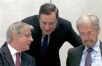 European Central Bank (ECB) President Mario Draghi (C) speaks to France's Central Bank Governor Christian Noyer (L) and Member of the Execut