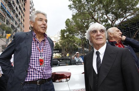 Formula One chairman Peter Brabeck-Letmathe (L) looks on next to Formula One commercial supremo Bernie Ecclestone during the Monaco F1 Grand Formula One chairman Peter Brabeck-Letmathe (L) looks on next to Formula One commercial supremo Bernie Ecclestone during the Monaco F1 Grand