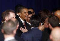 U.S. President Barack Obama greets audience members at a gala fundraiser for the gay community in New York City June 23, 2011. REUTERS/Jason