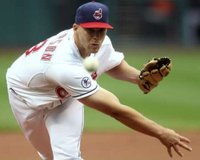 Cleveland Indians starting pitcher Justin Masterson pitches against the Detroit Tigers during a MLB American League baseball game in Cleveland, Ohio. REUTERS/Aaron Josefczyk