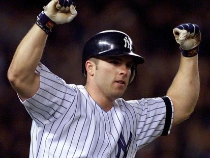 Chad Curtis hits a homer in this Reuters file photo. Chad Curtis hits a homer in this Reuters file photo.