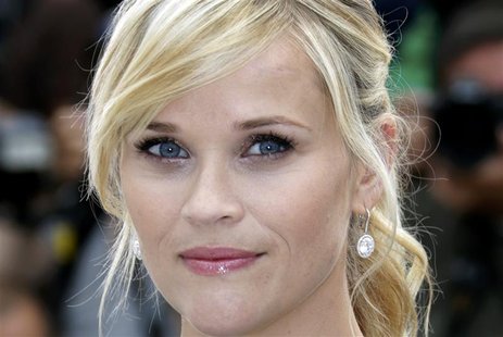 Cast member Reese Witherspoon poses during a photocall for the film "Mud", in competition at the 65th Cannes Film Festival, May 26, 2012. RE Cast member Reese Witherspoon poses during a photocall for the film "Mud", in competition at the 65th Cannes Film Festival, May 26, 2012. RE
