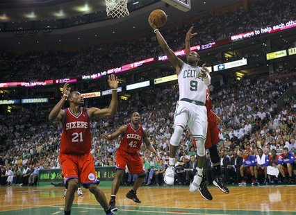 Boston Celtics point guard Rajon Rondo (9) drives to the net on Philadelphia 76ers' Thaddeus Young (L) during the second half of Game 7 of t Boston Celtics point guard Rajon Rondo (9) drives to the net on Philadelphia 76ers' Thaddeus Young (L) during the second half of Game 7 of t
