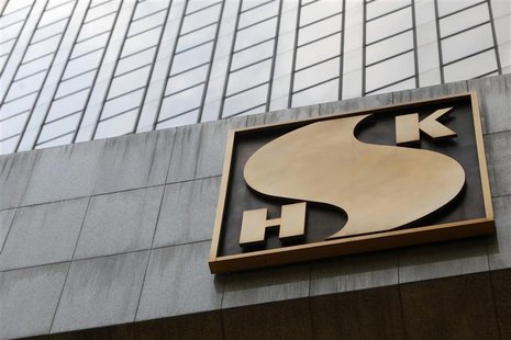 The company logo of Sun Hung Kai Properties is seen outside its headquarters in Hong Kong May 4, 2012. REUTERS/Tyrone Siu The company logo of Sun Hung Kai Properties is seen outside its headquarters in Hong Kong May 4, 2012. REUTERS/Tyrone Siu