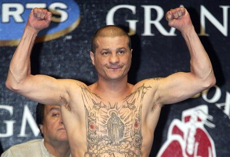 Boxer Johnny Tapia poses during a weigh-in in Las Vegas in this November 1, 2002 file photo. Tapia was found dead at his home in Albuquerque Boxer Johnny Tapia poses during a weigh-in in Las Vegas in this November 1, 2002 file photo. Tapia was found dead at his home in Albuquerque