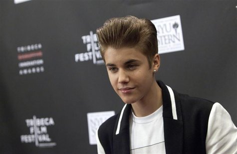 Justin Bieber attends the 3rd annual Tribeca Disruptive Innovation Awards during the 2012 Tribeca Film Festival at NYU Paulson Auditorium in Justin Bieber attends the 3rd annual Tribeca Disruptive Innovation Awards during the 2012 Tribeca Film Festival at NYU Paulson Auditorium in