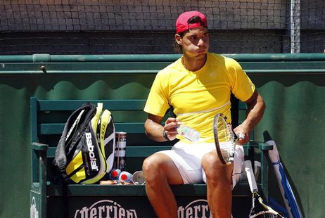 Rafael Nadal of Spain takes part in a training session day before the start of the French Open tennis tournament at the Roland Garros stadiu Rafael Nadal of Spain takes part in a training session day before the start of the French Open tennis tournament at the Roland Garros stadiu