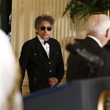 Musician Bob Dylan (C) arrives prior to receiving a Presidential Medal of Freedom in the East Room of the White House in Washington, May 29,
