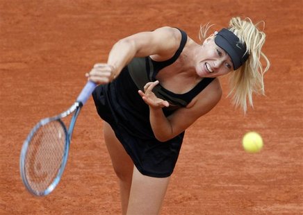 Maria Sharapova of Russia serves to Ayumi Morita of Japan during the French Open tennis tournament at the Roland Garros stadium in Paris Jun Maria Sharapova of Russia serves to Ayumi Morita of Japan during the French Open tennis tournament at the Roland Garros stadium in Paris Jun