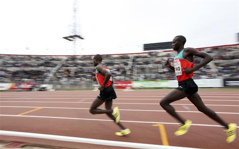 Wilson Kiprop (R) of Kenya races against compatriot Matthew Kisorio during the 10,000m men's final race at the 2010 African Athletics Champi Wilson Kiprop (R) of Kenya races against compatriot Matthew Kisorio during the 10,000m men's final race at the 2010 African Athletics Champi