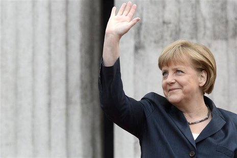 German Chancellor Angela Merkel waves to spectators during the arrival for the "Council of the Baltic Sea States" summit in Stralsund, May 3 German Chancellor Angela Merkel waves to spectators during the arrival for the "Council of the Baltic Sea States" summit in Stralsund, May 3