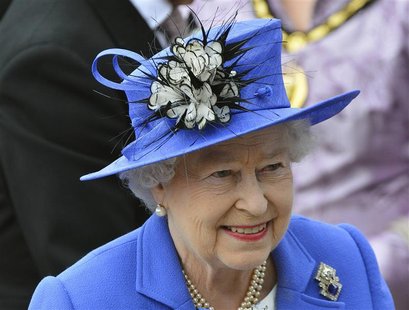 REFILE - ADDING THE WORDS 'DIAMOND JUBILEE' IN CAPTION Britain's Queen Elizabeth arrives at the Epsom Derby festival in Epsom, southwest of REFILE - ADDING THE WORDS 'DIAMOND JUBILEE' IN CAPTION Britain's Queen Elizabeth arrives at the Epsom Derby festival in Epsom, southwest of