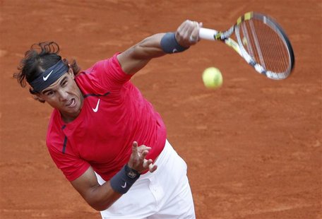 Rafael Nadal of Spain serves to Juan Monaco of Argentina during the French Open tennis tournament at the Roland Garros stadium in Paris June Rafael Nadal of Spain serves to Juan Monaco of Argentina during the French Open tennis tournament at the Roland Garros stadium in Paris June