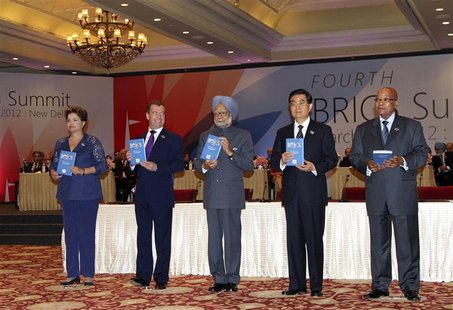 (From L-R) Brazil's President Dilma Rousseff, Russian President Dmitry Medvedev, Indian Prime Minister Manmohan Singh, Chinese President Hu (From L-R) Brazil's President Dilma Rousseff, Russian President Dmitry Medvedev, Indian Prime Minister Manmohan Singh, Chinese President Hu