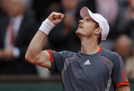 Andy Murray of Britain reacts after winning his match against Richard Gasquet of France during the French Open tennis tournament at the Rola Andy Murray of Britain reacts after winning his match against Richard Gasquet of France during the French Open tennis tournament at the Rola