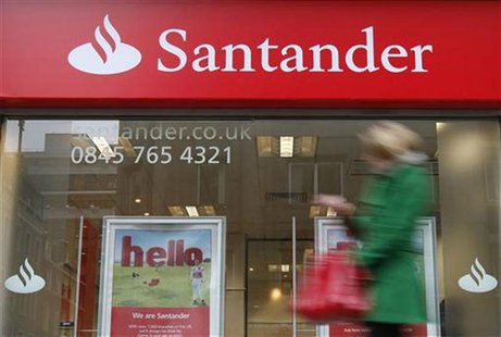 A pedestrian walks past a branch of a Santander bank in London, January 11, 2010. REUTERS/Suzanne Plunkett A pedestrian walks past a branch of a Santander bank in London, January 11, 2010. REUTERS/Suzanne Plunkett