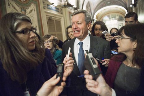 U.S. Senator Max Baucus (D-MT) (C) talks to reporters after meeting with his fellow Democratic members of the 'super committee' at the U.S. U.S. Senator Max Baucus (D-MT) (C) talks to reporters after meeting with his fellow Democratic members of the 'super committee' at the U.S.