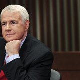 Democratic challenger and Milwaukee Mayor Tom Barrett sits at a table as he waits for Republican Wisconsin Governor Scott Walker before the Democratic challenger and Milwaukee Mayor Tom Barrett sits at a table as he waits for Republican Wisconsin Governor Scott Walker before the