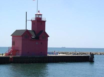 The SS Keewatin (in distance) sails past Holland Harbor Monday on its way to its new home in Ontario, Canada. The SS Keewatin (in distance) sails past Holland Harbor Monday on its way to its new home in Ontario, Canada.
