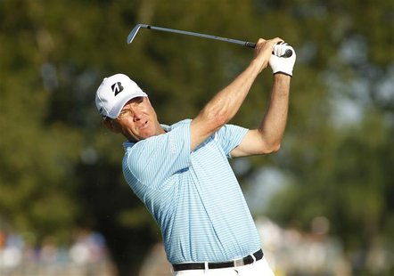 Davis Love III of the U.S. tees off on the sixth hole during second round play in the Honda Classic PGA golf tournament at PGA National Golf Davis Love III of the U.S. tees off on the sixth hole during second round play in the Honda Classic PGA golf tournament at PGA National Golf