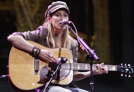 Singer/songwriter Sheryl Crow performs for Starbucks shareholders at the coffee company's annual meeting in Seattle, Washington March 24, 20 Singer/songwriter Sheryl Crow performs for Starbucks shareholders at the coffee company's annual meeting in Seattle, Washington March 24, 20
