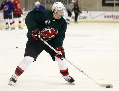 New Jersey Devils Petr Sykora shoots the puck during a team practice before Game 3 of the NHL Stanley Cup Final between the New Jersey Devil New Jersey Devils Petr Sykora shoots the puck during a team practice before Game 3 of the NHL Stanley Cup Final between the New Jersey Devil
