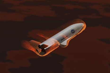 Artist's concept of an X-37 reusable unmanned spacecraft in flight in this undated handout image courtesy of NASA. REUTERS/NASA/Marshall Spa Artist's concept of an X-37 reusable unmanned spacecraft in flight in this undated handout image courtesy of NASA. REUTERS/NASA/Marshall Spa