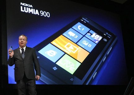 Nokia CEO Stephen Elop displays the Nokia Lumia 900 smartphone at the Consumer Electronics Show opening in Las Vegas January 9, 2012. REUTER Nokia CEO Stephen Elop displays the Nokia Lumia 900 smartphone at the Consumer Electronics Show opening in Las Vegas January 9, 2012. REUTER