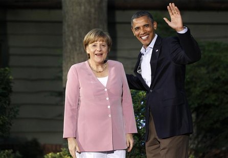 President Barack Obama greets Germany's Chancellor Angela Merkel as she arrives at the G8 Summit at Camp David, Maryland, May 18, 2012. REUT President Barack Obama greets Germany's Chancellor Angela Merkel as she arrives at the G8 Summit at Camp David, Maryland, May 18, 2012. REUT